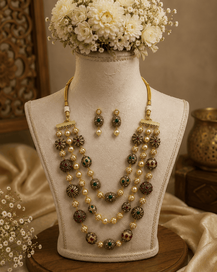 Gold-tone 3-layer mala set with green stones, pearl strands, and matching drop earrings