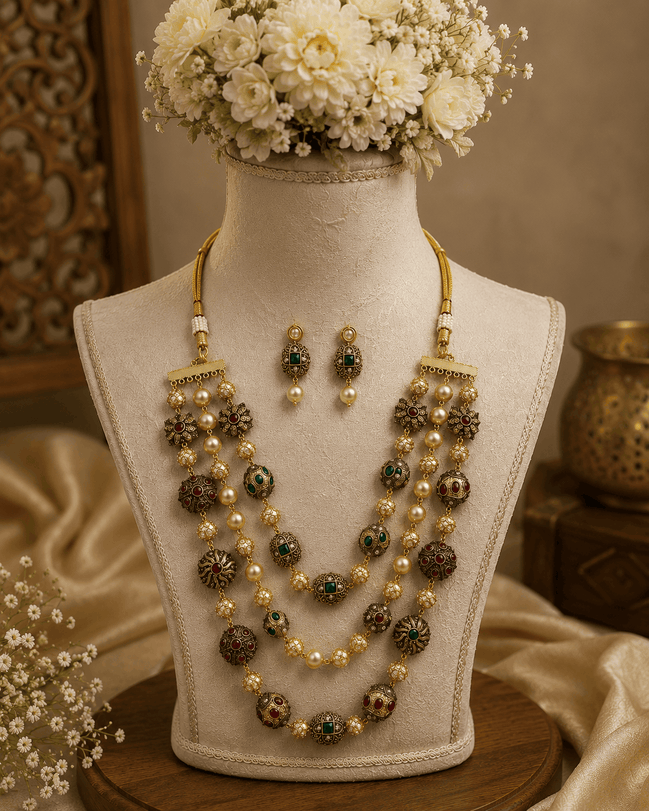 Gold-tone 3-layer mala set with green stones, pearl strands, and matching drop earrings