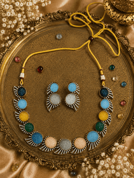 Multicolor beaded stone necklace set with matching earrings, gold-tone accents