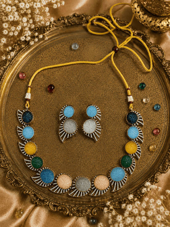Multicolor beaded stone necklace set with matching earrings, gold-tone accents