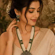 Emerald green beaded necklace set with large round pendant and matching drop earrings