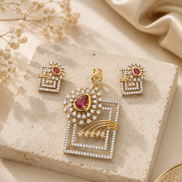 Gold-tone ruby red pendant and stud earring set with geometric square design