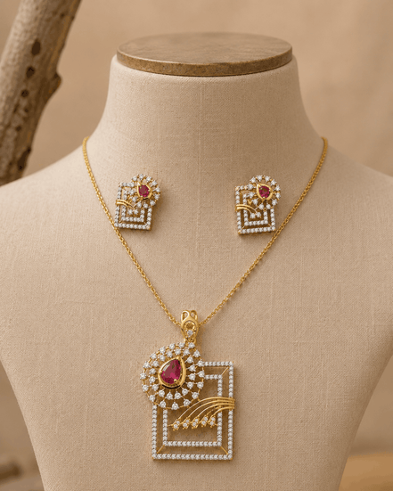 Gold-tone ruby red pendant necklace with matching stud earrings, geometric square motif