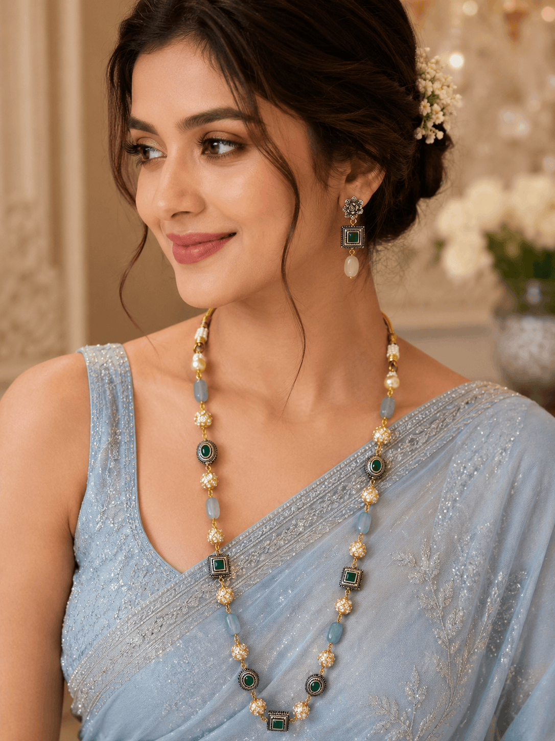 Gold-tone mala necklace with teal square beads and matching stud earrings