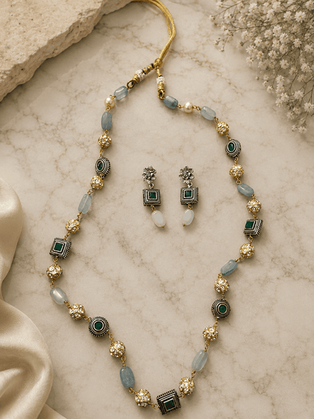Gold-tone mala necklace with teal beads and matching double-drop earrings, set