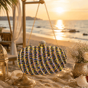 Multicolor beaded oval clutch with gold-tone clasp and hanging gold chain