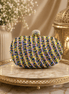 Multicolor beaded oval clutch with gold-tone top clasp and short gold handle