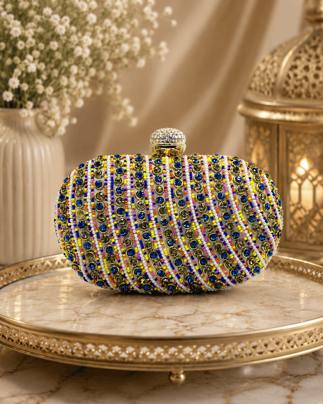 Multicolor beaded oval clutch with gold-tone top clasp and short gold handle