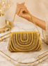 Gold beaded shoulder bag with ornate arched front and fringe bead trim