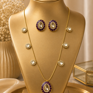 Gold-tone necklace and stud earring set with purple round center medallion pendant