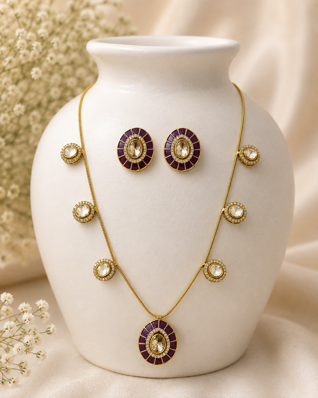 Gold-tone jewelry set: Y necklace with round medallions and matching stud earrings
