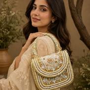 Beige beaded shoulder bag on model, side view with layered bead edging
