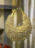 Gold crystal hobo bag with mesh fringe and loop top handles