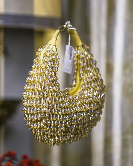 Gold crystal hobo bag, side view, mesh beaded fringe with hanging tag
