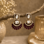 Gold-tone fan statement earrings with oval crystal stones and maroon enamel petals