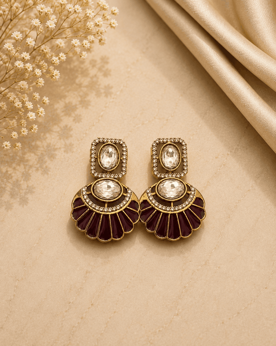 Gold-tone fan earrings with bezel crystal centers and maroon enamel scalloped petals