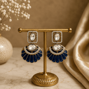 Gold-tone fan statement earrings with oval crystals and navy enamel scalloped petals