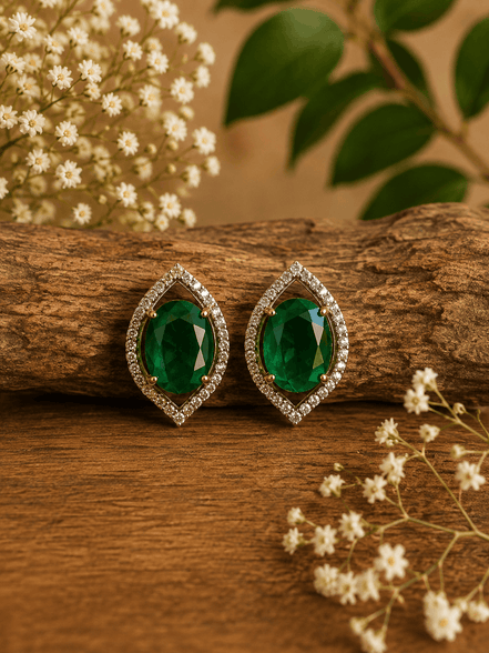 Green teardrop halo stud earrings with pave crystal border, gold-tone setting.