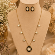 Gold-tone necklace set with black oval center pendant and matching stud earrings