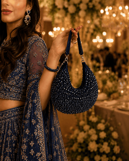 Navy blue beaded hobo bag with dangling beaded handles