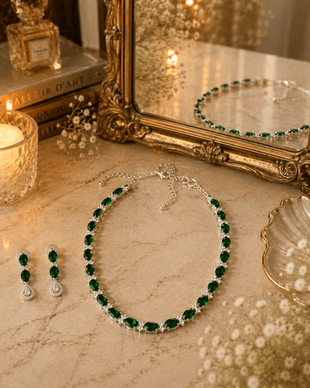 Emerald-green beaded necklace with matching drop earrings and silver-tone chain