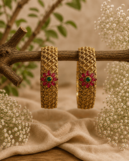 Antique gold wide bangles with pink & green floral center stones, textured lattice