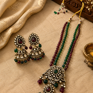 Beaded long necklace and round gemstone chandelier earrings, brass-tone set