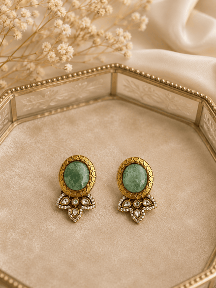 Green oval stud earrings with gold bezel and crystal teardrop chandelier charms