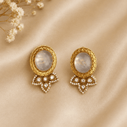 Gray oval stud earrings with gold halo and crystal heart-shaped drops
