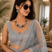 Multicolor beaded stone necklace set with dangling earrings on a model