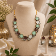 Beaded multicolor stone necklace on display with matching stud earrings