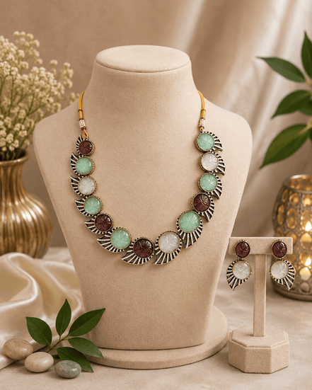 Beaded multicolor stone necklace on display with matching stud earrings