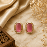 Rose pink crystal stud earrings with gold-tone halo