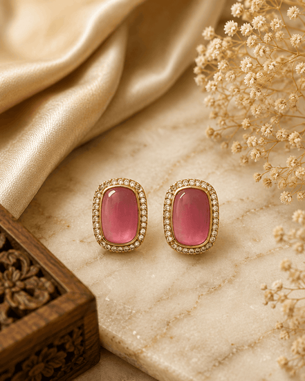 Rose pink crystal stud earrings with gold-tone halo
