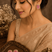 Ishira rose pink crystal stud earrings with gold-tone halo