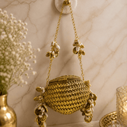 Kaira shell bag in gold with beaded chain and shell charm tassels