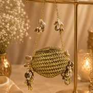 Kaira shell bag, gold woven round design with hanging shell charm drops