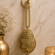 Gold Kiva potli hanging, oval teardrop embroidered pouch with long beaded tassel