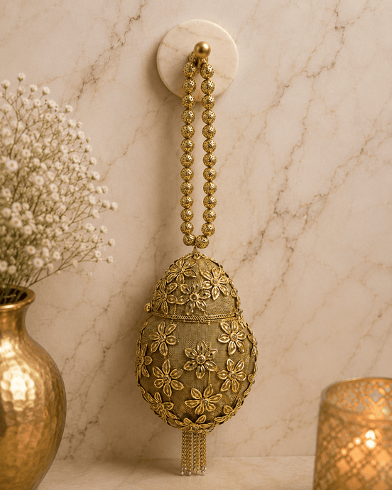 Gold Kiva potli hanging, oval teardrop embroidered pouch with long beaded tassel