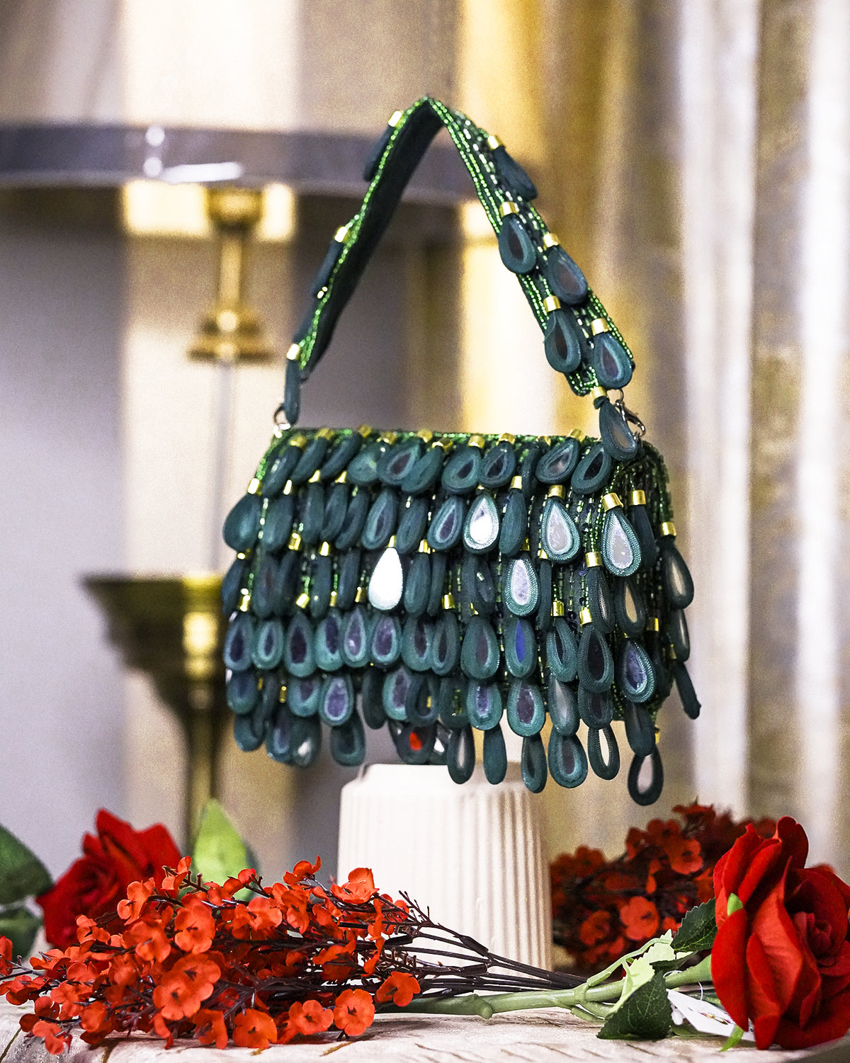 Teal green beaded hobo bag with scalloped teardrop bead fringe and top handles