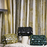 Set of three beaded hobo bags: black, beige, and teal with dangling teardrop fringe
