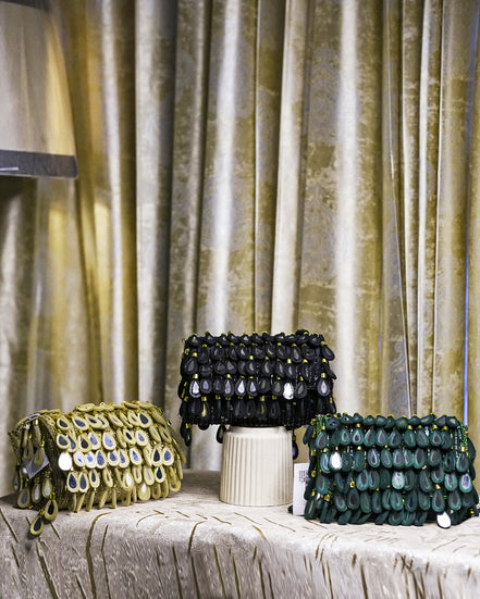 Set of three beaded hobo bags: black, beige, and teal with dangling teardrop fringe