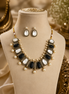 Mahira Heritage necklace set with black and white oval stones, pearl drops, stud earrings.