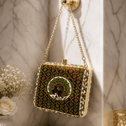 Embroidered clutch bag with chain handle and hinged clasp, dark green and gold
