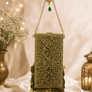 Gold filigree mobile clutch with chain handle and green jeweled center, hanging coin fringe