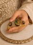 Mira Royal cuff bracelet with gold-tone bangle and multicolor oval enamel center