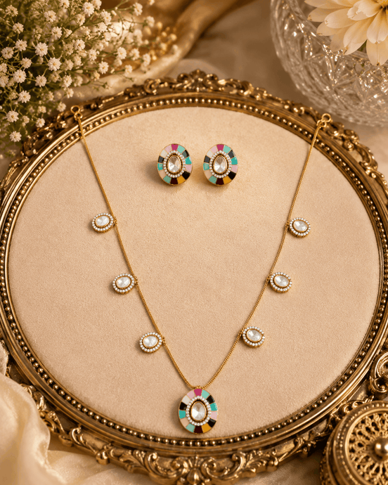 Gold-tone necklace set with turquoise and multicolor center pendant and oval stud earrings