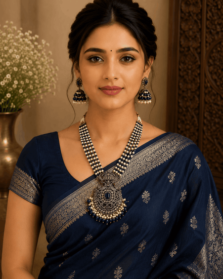 Navy blue beaded pearl necklace set with ornate pendant and matching dangling earrings