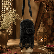 Black beaded velvet potli clutch with wrist strap and rounded flap