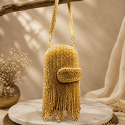 Gold-tone beaded velvet potli clutch with mini flap and long chain straps
